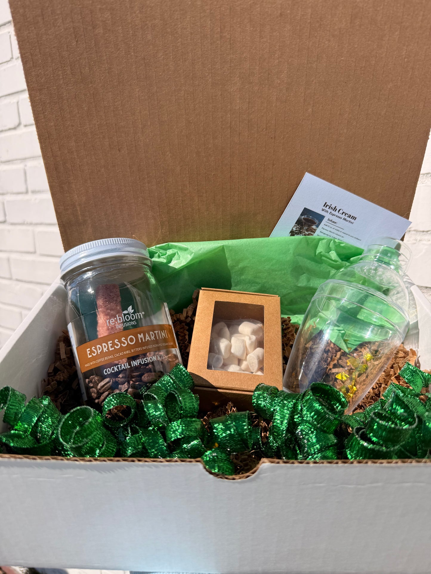 rebloom infusions espresso martini cocktail kit with a shaker and box of marshmallows inside a cardboard box.