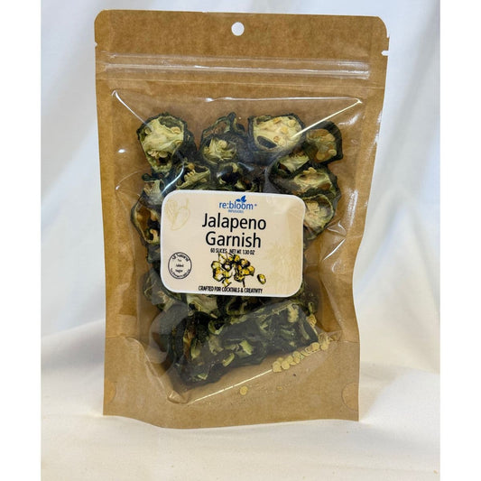 Packaged jalapeño garnish slices with visible re:bloom Infusions label on a white background.