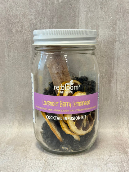 Jar of Lavender Berry Lemonade cocktail infusion kit with a visible label on a neutral background