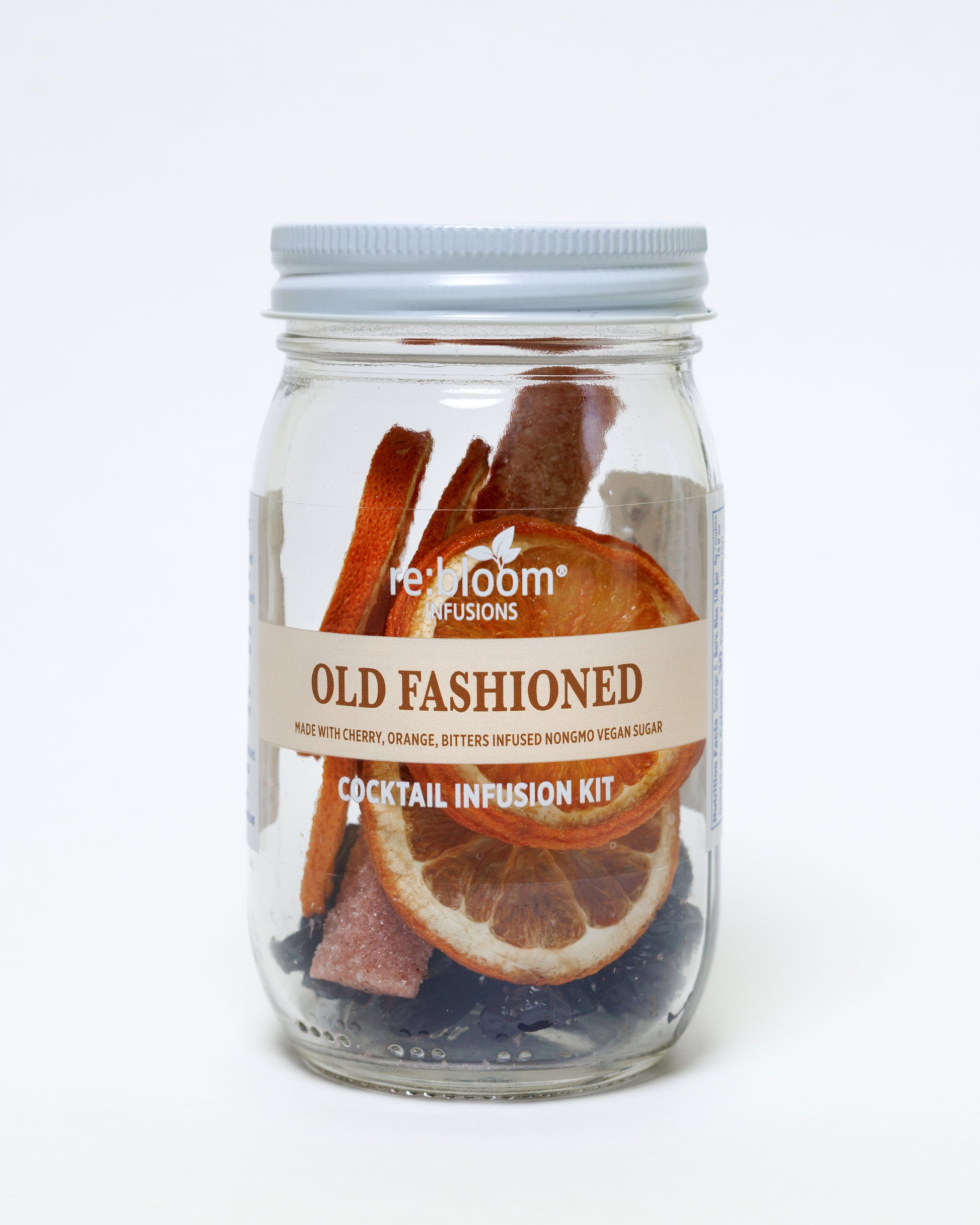 Cocktail infusion kit in a glass jar with a label on a white background