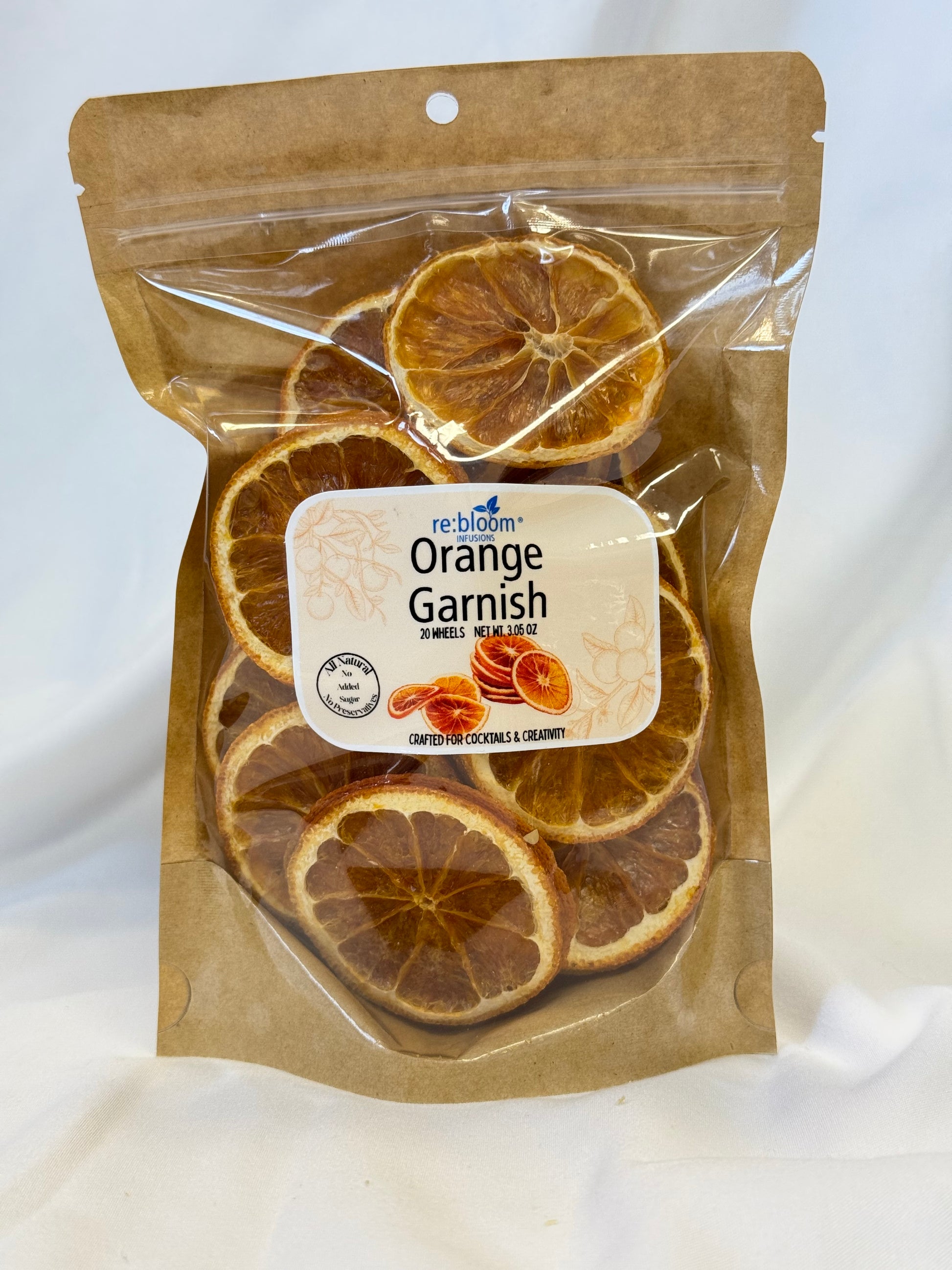 Packaged dried orange slices with a visible label on a white background