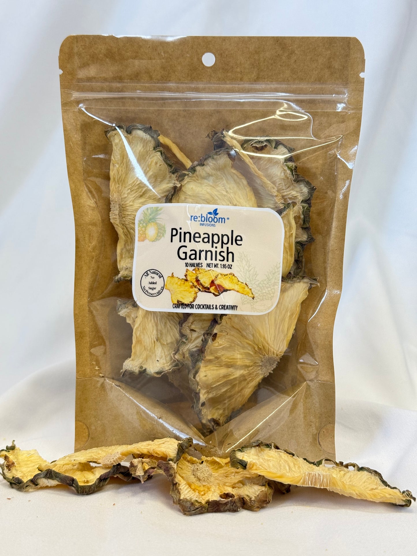 Packaged pineapple garnish with a label on a white background