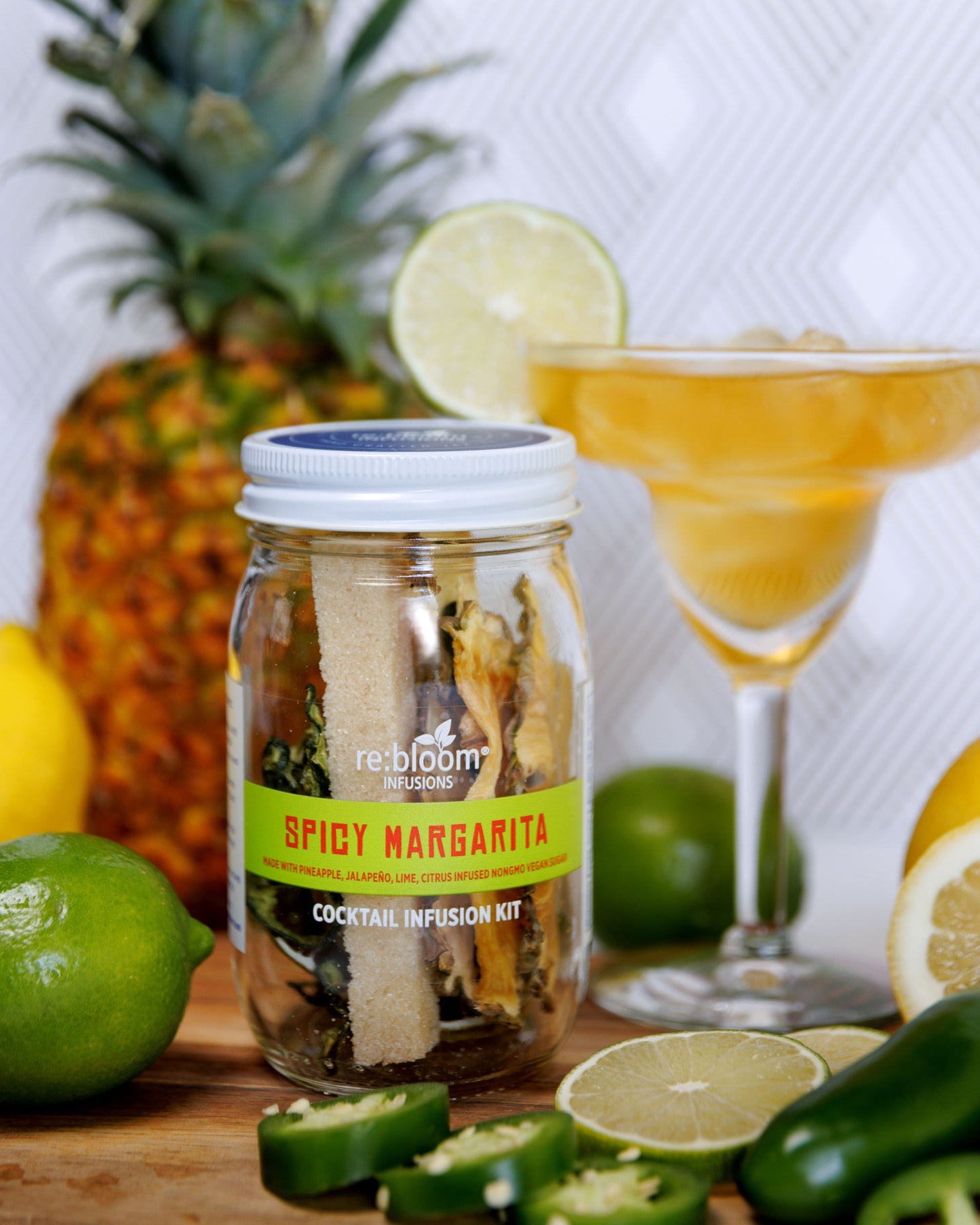 Spicy Margarita cocktail infusion kit with ingredients and a glass of margarita.