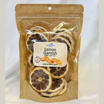 Dried lemon garnish slices packaged in a bag for cocktails and mocktails on a white background.