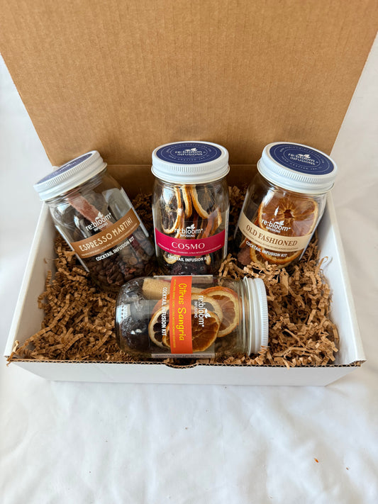 Assorted cocktail infusion jars in a white gift box